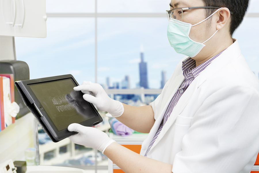 singapore oral surgeon placing missing teeth