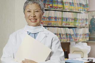 bigstock-Senior-female-dentist-in-offic-47800333