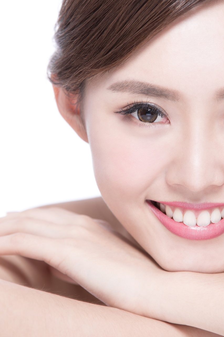 bigstock-Charming-Woman-Smile-Face-100745381.jpg