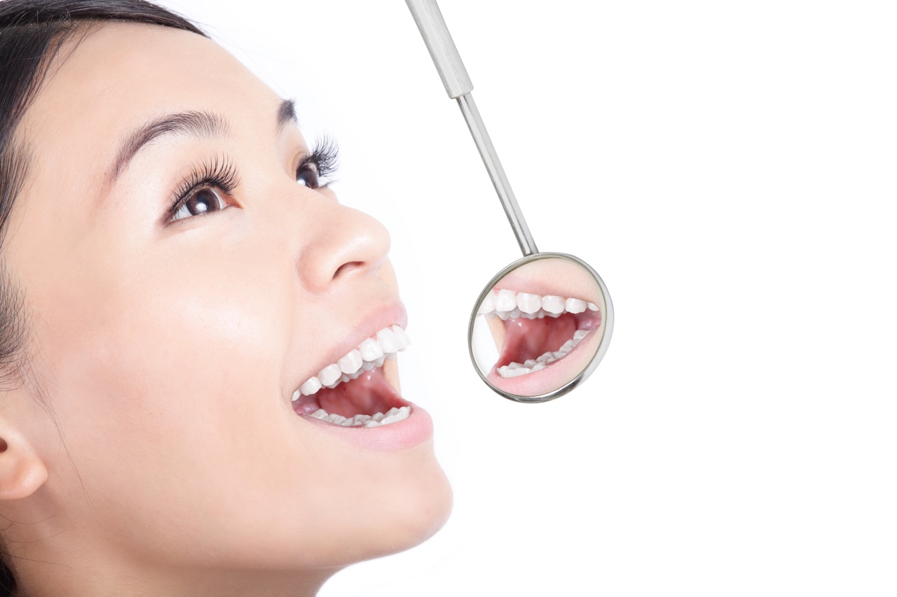 bigstock-Healthy-Woman-Teeth-With-A-Den-51046225.jpg