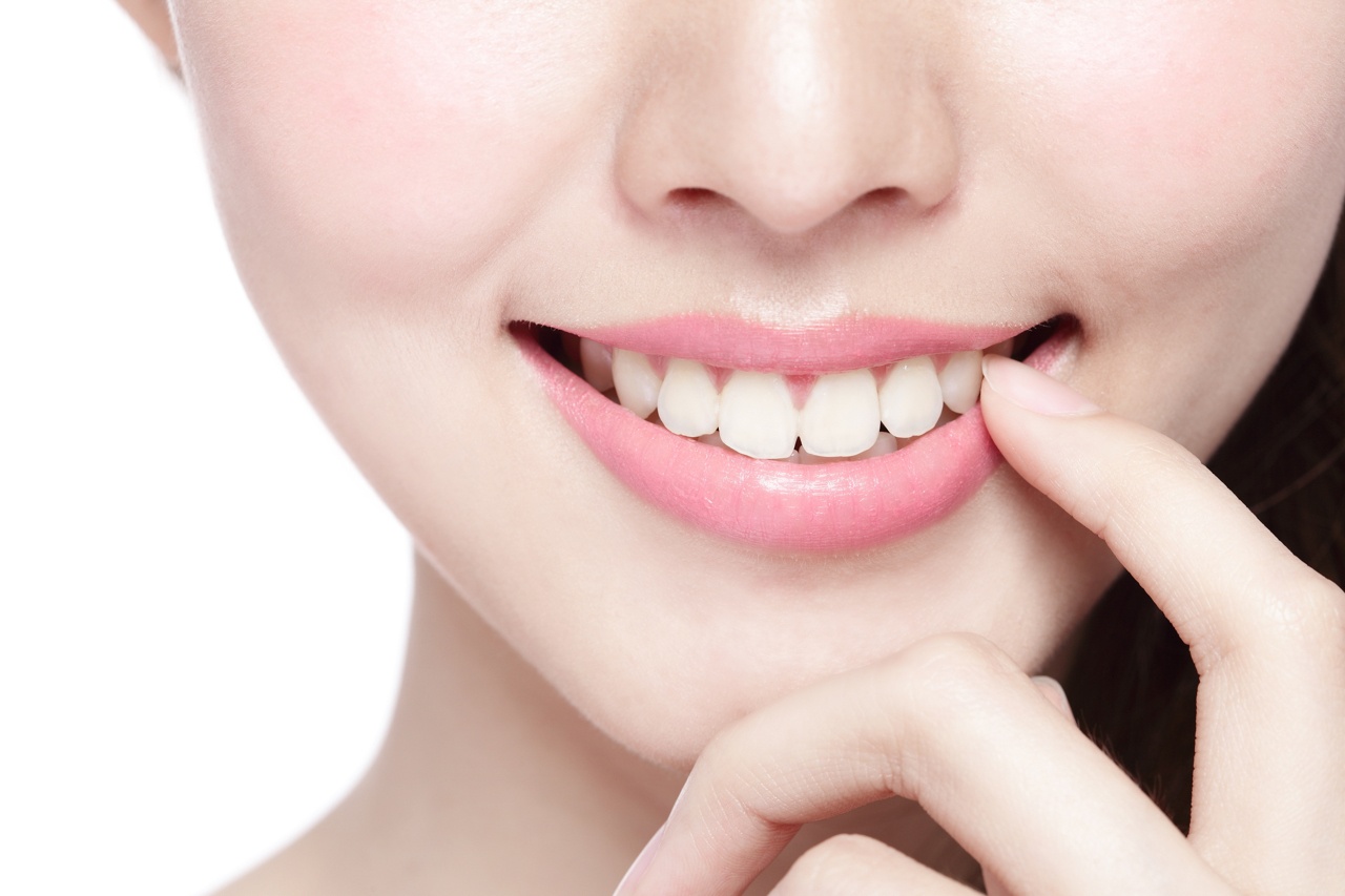 perfectly aligned teeth in a young woman